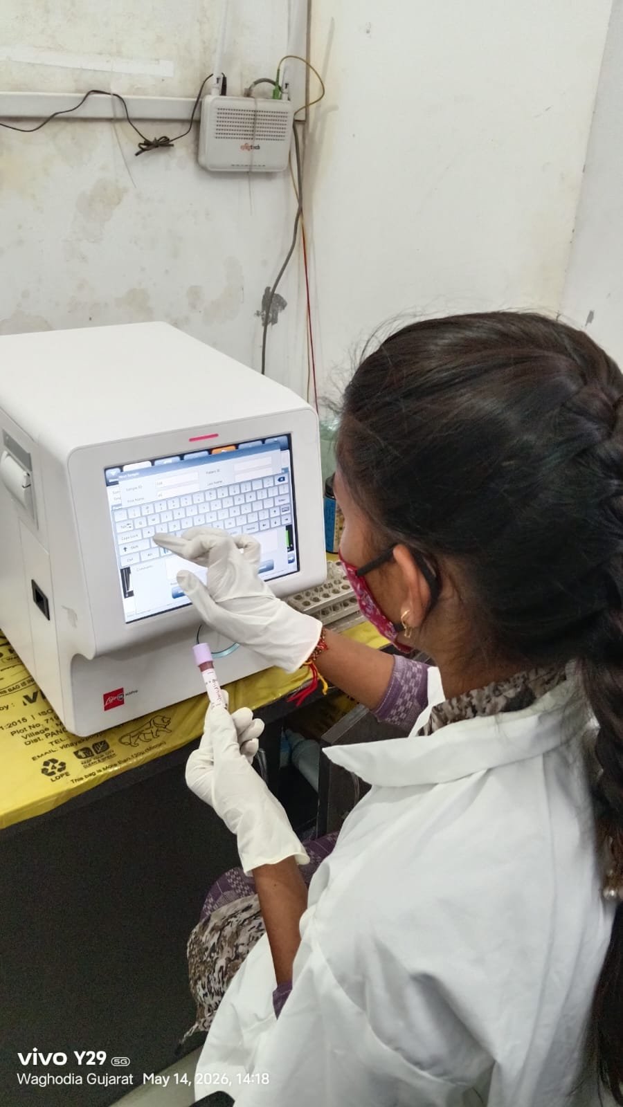 Sample being registered on the lab analyzer